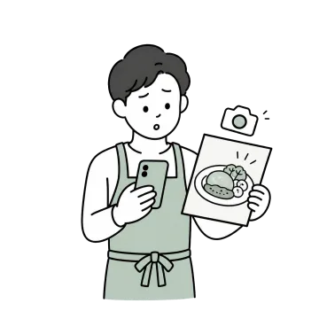 古いメニュー写真を見て困っている若い男性店舗オーナーのイラスト
